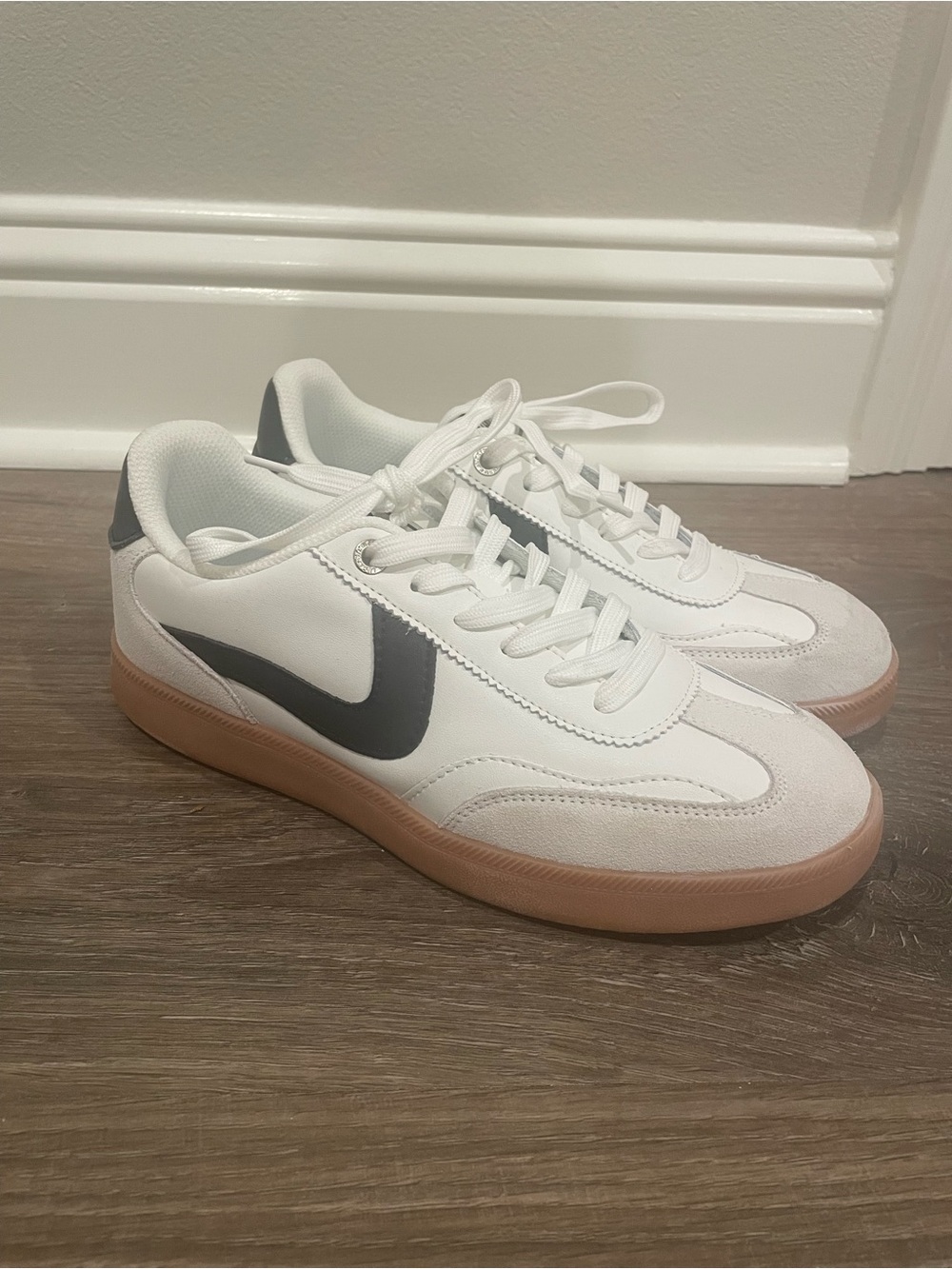 Women’s White Sneakers with Black Swoosh and Gum Sole